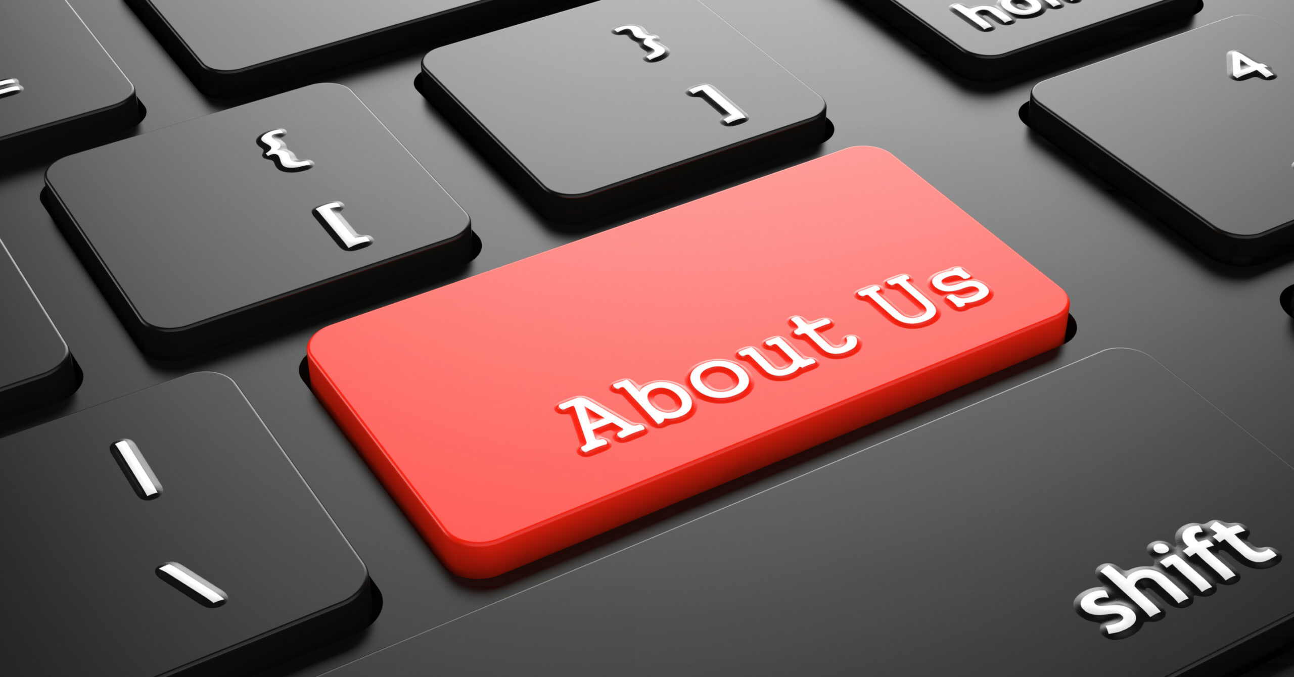 About Us on Red Keyboard Button. About Us on Red Button Enter on Black Computer Keyboard.